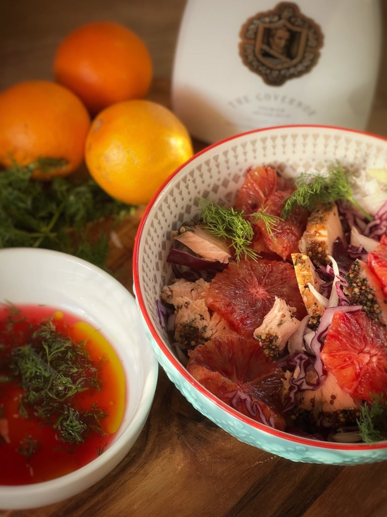 Salmon, blood orange, fennel, and red cabbage salad with a dill dressing